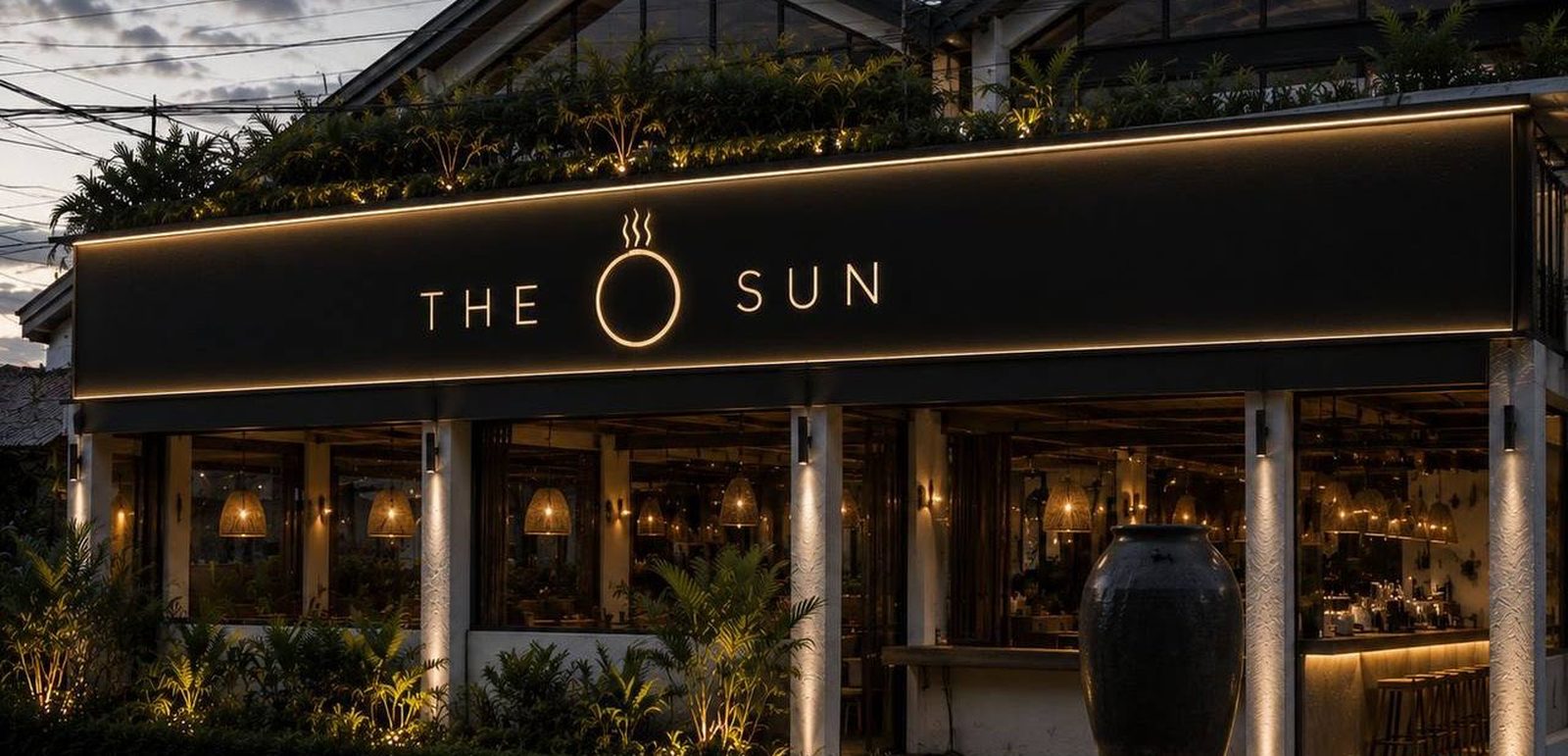 The Sun restaurant facade in Canggu at dusk